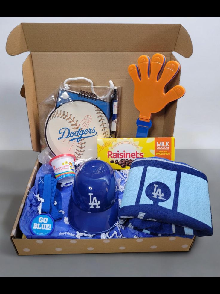 a baseball gift box with gloves, mitts and other items