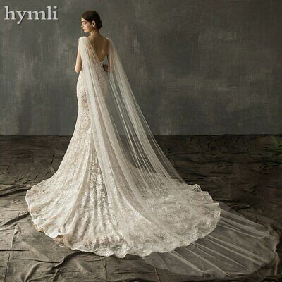 a woman in a wedding dress with a long veil on her head and the words hyrmii written above it