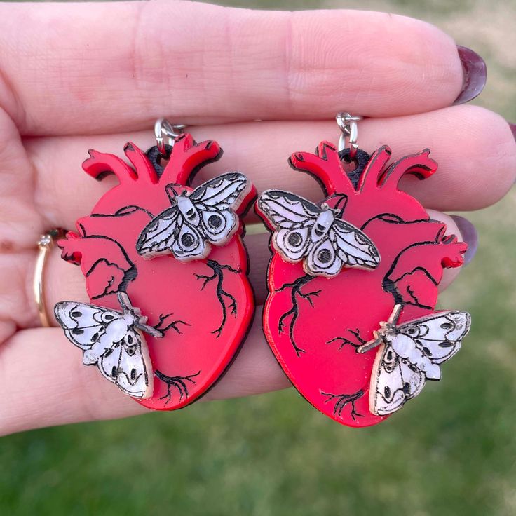 "Made from lightweight acrylic with hand painted details. Attached to your choice of earring post. Measure 1.5\" tall" Moth Earrings, Weird Jewelry, Clay Jewelry Diy, Jewelry Boards, Earring Post, Funky Jewelry, Really Cute Outfits, Fun Earrings, Diy Earrings