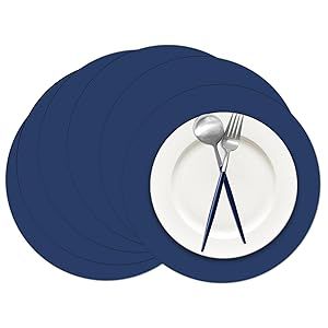 three blue plates with forks and spoons on them, sitting next to each other