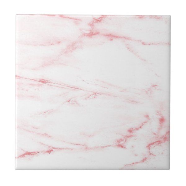 a white and pink marble tile with red streaks on the bottom, in an irregular pattern