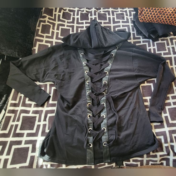 I'm Pretty Sure Its Called The "Hoodoo Voodoo Sweater" But I Cannot Fid Irl Pics Of It Anywhere. But Its A Size Med, Never Got To Wear, Bought It With Tags Then It Just Hung In My Closet. This Is A Deadstock Item And Very Hard To Find. Pit-23 Overall-31 From Shoulder Measurements Are Approximate Black Punk Hoodie Top, Fall Punk Hooded Top, Alternative Fall Hoodie Top, Alternative Style Hoodie Tops For Fall, Punk Halloween Hooded Top, Alternative Hooded Top For Fall, Punk Halloween Hoodie Top, Halloween Punk Hoodie Tops, Alternative Halloween Hoodie Tops