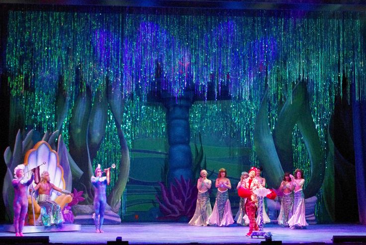 the cast of disney's the little mermaid on stage