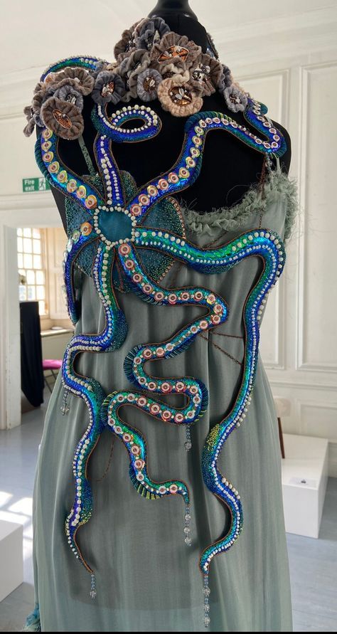 a dress made out of beads and fabric