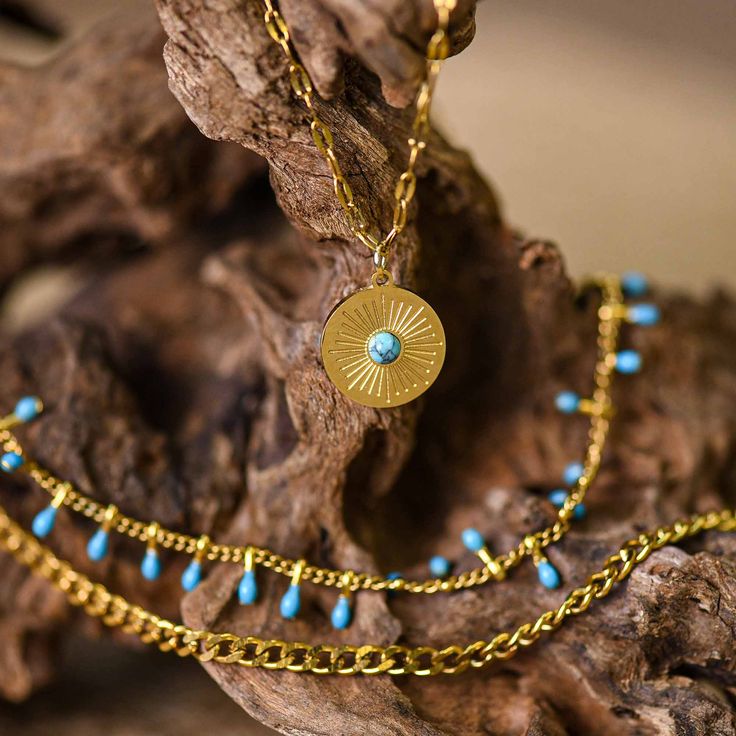 Gemstone: Natural turquoise Chain Material: 18K Gold Plated Chain Length: 16" with 2" extender *Our jewelry features natural, genuine gemstones, ensuring each piece is unique and one-of-a-kind. Please note that, as no two gemstones are identical, the jewelry you receive may vary from the photos.*It is recommended to wipe the necklace regularly to maintain its luster, avoid contact with chemicals, and store it properly to avoid scratches or damage. Adjustable Gold Turquoise Pendant Necklace, Gold Turquoise Adjustable Pendant Necklace, Turquoise Pendant Charm Necklace With Adjustable Chain, Gold Turquoise Pendant Necklace With Adjustable Chain, Adjustable Gold Turquoise Gemstone Necklace, Adjustable Gold Turquoise Necklace With Gemstone, Gold Turquoise Necklace With Adjustable Chain, Gold Turquoise Necklace With Adjustable Chain As A Gift, Gold Turquoise Necklace With Adjustable Chain For Gift