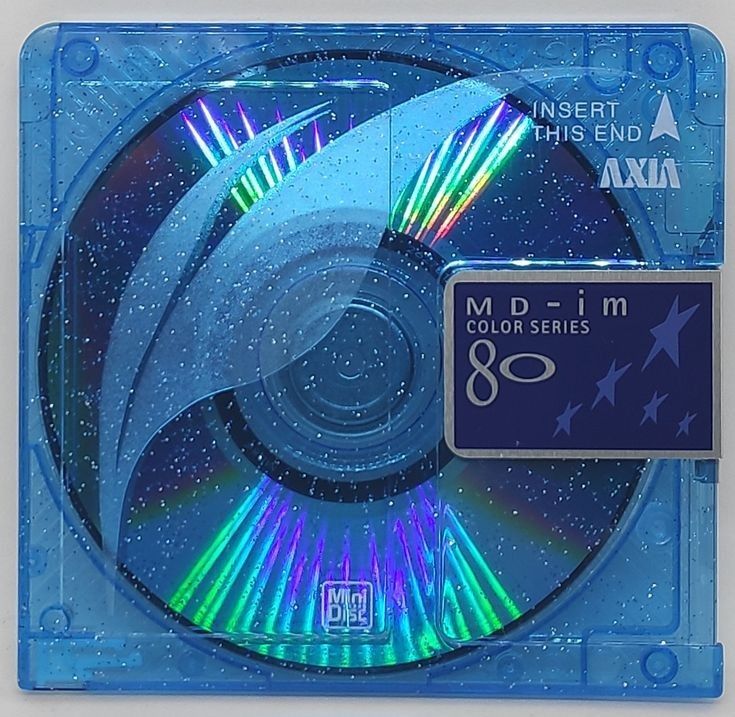 cd disc with multi - colored lights in the middle and blue cover, on white background