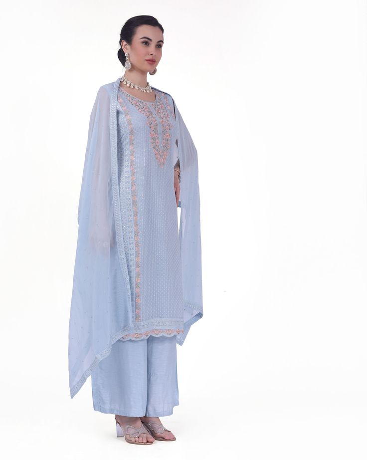 Arya Georgette Tiki Resham Embroidered Palazzo Suit. Readymade premium georgette fabric Enhanced with tiki & resham embroidery work Comes with dupatta, palazzo pants Sleeves attached as per image. Experience elegance and comfort with our Arya Palazzo Suit. Made with high-quality georgette fabric and featuring stunning Tiki Resham embroidery, this suit is perfect for any occasion. The palazzo pants provide a relaxed fit and added convenience. Eid Floor-length Palazzo Set With Chikankari Embroidery, Long Sharara With Sheer Dupatta In Georgette, Long Georgette Sharara With Sheer Dupatta, Semi-stitched Floor-length Georgette Palazzo Set, Floor-length Semi-stitched Georgette Palazzo Set, Formal Salwar Kameez With Resham Embroidery In Georgette, Unstitched Long Georgette Anarkali Set, Floor-length Georgette Palazzo Set For Navratri, Unstitched Georgette Long Anarkali Set