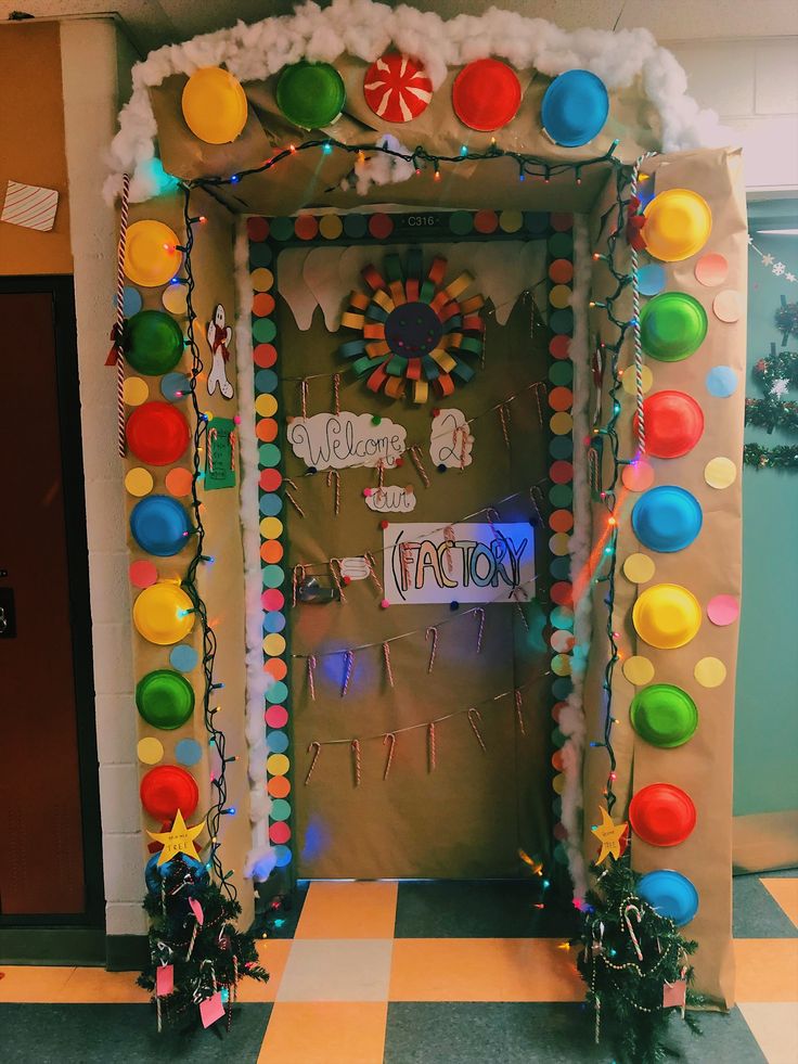 a door decorated with balloons and candy canes