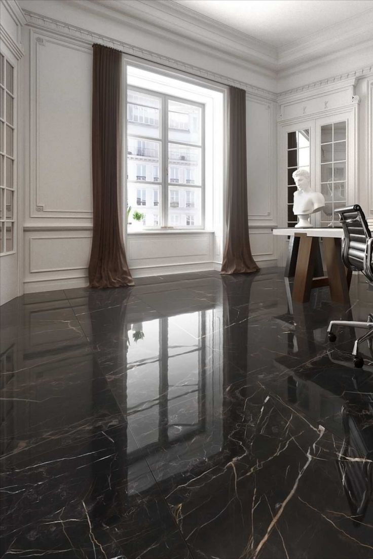 an office with black marble floors and white walls