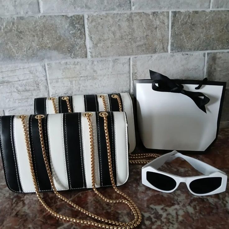 New Medium-Sized Black And White Bags With Gold Chains Straps White Party Bag With Chain, Trendy White Shoulder Bag, Trendy White Bag With Chain Strap, Rectangular Bags With Chain Strap For Day Out, White Shoulder Bag With Chain Strap For Summer, Chic White Bag With Chain Detail, Chic White Bag With Chain, White Chain Strap Shoulder Bag For Summer, White Bag With Chain Strap