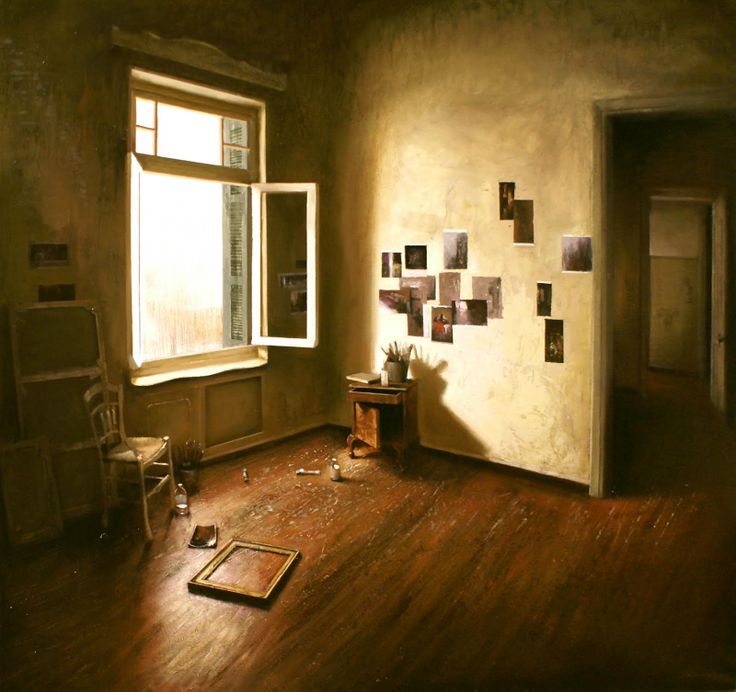 an empty room with wooden floors and a painting hanging on the wall next to a window