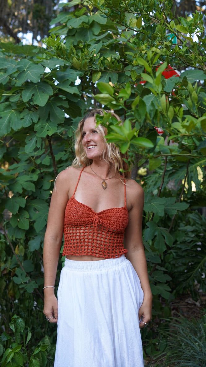 Introducing our new fave: the Bali crochet top! Handmade with bohemian flair, this casual top is perfect for everyday wear. Perfect for those who don't take themselves too seriously. Handcrafted with love by us! Details: * Sleeveless ; Back Cross Tie * One Size Fits All * Organic Cotton WASHING TIPS* Hand wash or gentle machine wash* No tumble drying* Cold Water Wash* Dry the flat cloth, try not hang it.Custom Orders of desired color, size or shapes are available with an extra 2-3 week shipping Crochet Top For Beach Season Day Out, Open Knit Top For Beach Season, Crochet Crop Top For Beach, Crochet Crop Top For The Beach, Summer Crochet Knit Top, Bohemian Open Knit Crop Top, Spring Bohemian Knit Top For Vacation, Bohemian Knit Top For Spring Vacation, Bohemian Spring Vacation Knit Top