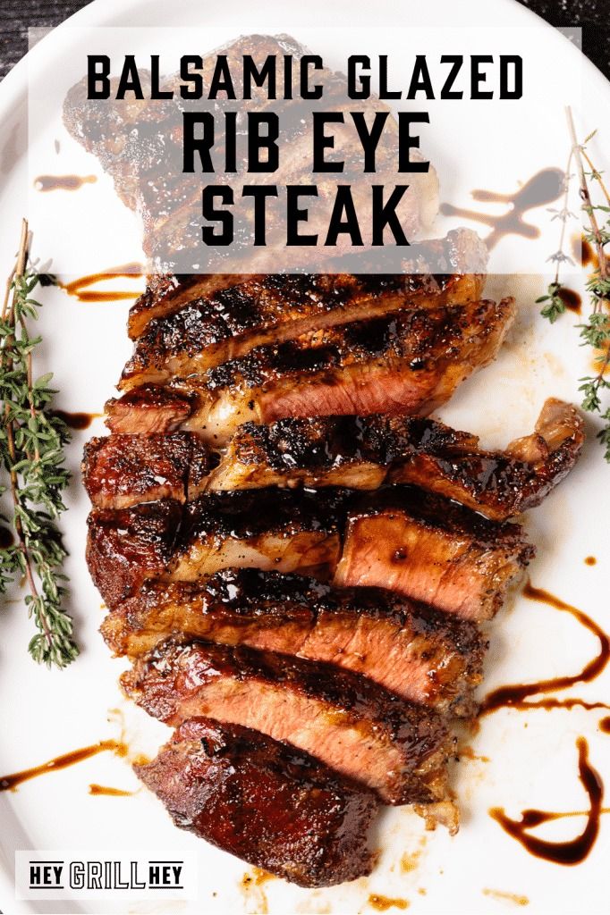 balsamic glazed ribeye steak on a white plate