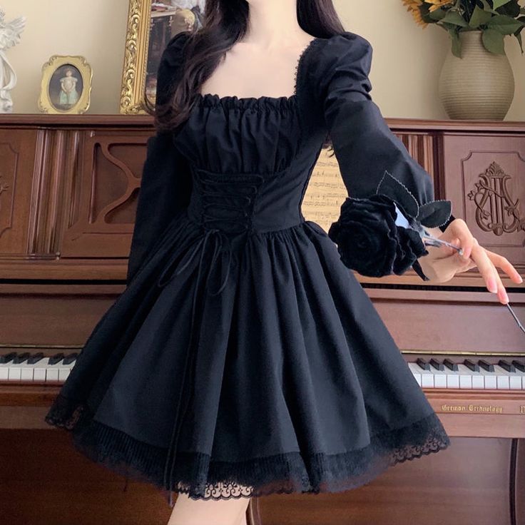 Dark Lolita Gothic Princess Dress with lace ruffles, stretchy back, laced-up front and long puff sleeves. 📝 Please note, the dress does not come with a petticoat (for the dress to have a puffy skirt volume as in the photos, you would need to add a petticoat underneath it). Plus sizes included. Size MBust: 80-88cm (stretchy) Waist: stretchy (60cm-72cm)Length: 82cm Size LBust: 80-92cm Waist: stretchy (64cm - 76cm)Length: 83cm Size XLBust: 84-96cm Waist: stretchy (68cm - 80cm)Length: 84cm Size XXL Long Sleeve Ruffled Balletcore Dress, Vintage Long Sleeve Corset Dress For Costume Party, Long Sleeve Corset Dress For Costume Party In Fall, Long Sleeve Corset Dress For Fall Costume Party, Fitted Dress With Lace-up Back For Costume Party, Elegant Long-sleeved Corset Dress For Costume Party, Fitted Lace Corset Dress With Long Sleeves, Gothic Long Sleeve Corset Dress, Gothic Long Sleeve Corset Dress For Fall