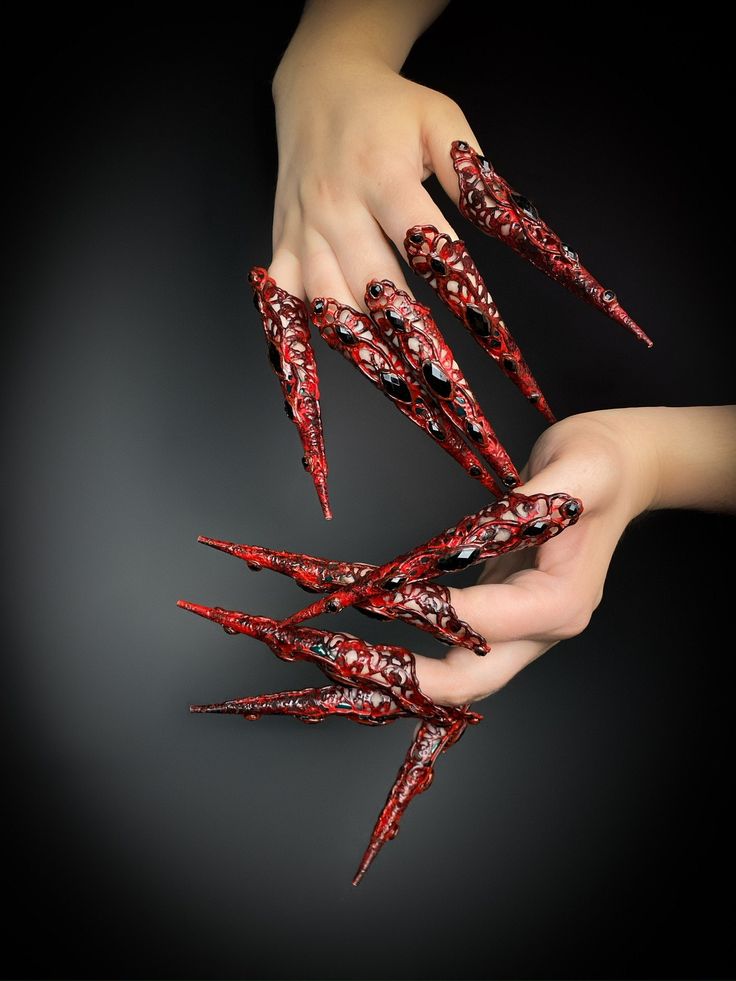 Spectacular red and black filigree finger claws, decorated with rhinestones. Their bloody gothic style will be a great addition to any look for a goth party, cosplay, summer festival, Burning Man, Halloween. Great props for a photo shoot. You can use them for photography, makeup or as part of a Halloween costume. 100% designed and handmade by our designers ( SETA Design studio in Kyiv).  It will be securely packed in a box. Feel free to contact us if you have any questions.   We accept return. C Finger Claws, Glamour Costumes, Halloween Sugar Skull, Goth Party, Jewelry Nails, Nails Jewelry, Gothic Party, Mermaid Outfit, Fantasy Props