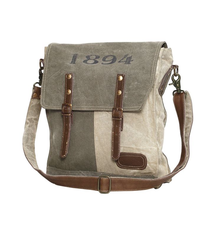 PRICES MAY VARY. {Lightweight Canvas Satchel} Take on the day with this earthy toned messenger bag. With subtle boho hints and a cool, lowkey vibe, you will love the look and feel of this canvas shoulder bag. Perfect for going to work, taking on vacation, and everyday use as well {Perfect for Day or Weekend Trips} This women’s satchel measures 12" x 3" x 13, with a leather shoulder strap that is 20" long. This laptop bag’s main pocket will fit all essentials like your tablet, planner, wallet, no Myra Bags, Work Essentials, Canvas Purse, Canvas Messenger Bag, Canvas Handbags, Canvas Shoulder Bag, Messenger Bags, Large Bag, Canvas Leather