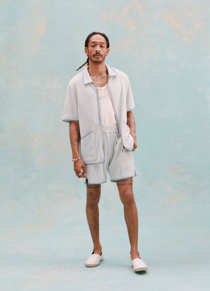 Very, very standard shirt, really. Nothing to see here! ;)Make it a set with matching shorts available here.Shop the rest of the 'Standard Issue' collection and other more basic Tombolo items here.100% Organic Cotton Terry Cloth (320gsm) Unisex Sizing DETAILS⎯⎯⎯ Two-way, antique-brass ring pull zipper. ⎯⎯⎯ Twin curved patch pockets. ⎯⎯⎯ Chain-stitched Tombolo interior label. ⎯⎯⎯ 1/8" edge binding along collar, zipper, and pockets. SIZING Thomas is 5' 10" with a 36" chest and a 30" waist. He is w Cotton Short Set With Built-in Shorts, Cotton Short Set With Built-in Shorts And Short Sleeves, Sporty Short Sleeve Short Set For Summer, Sporty Short Set With Short Sleeves For Summer, Cotton Athleisure Sets With Short Sleeves, Casual Short Sleeve Short Set, Casual Relaxed Fit Short Set, Casual Short Set With Relaxed Fit, Casual Short Set With Built-in Shorts