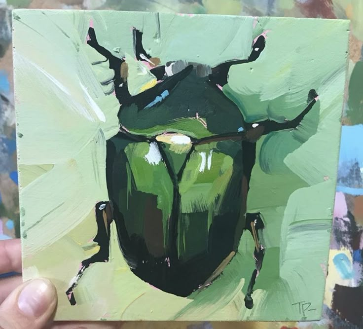 a painting of a green beetle with black spots