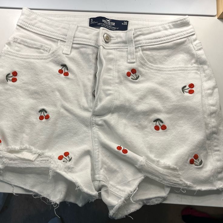 White Jean Shorts With Cherries. Never Worn New Condition! Cute White Fitted Bottoms, Cute Fitted White Bottoms, Cute White Short Length Shorts, Cute White Cotton Shorts, Cute White High Waist Bottoms, Cute High Waist White Shorts, Cute White Short Bottoms, Cute White Spring Shorts, Trendy High Waist White Bottoms