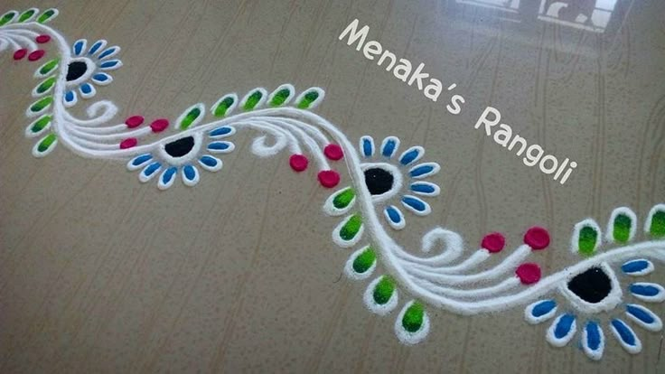 an artistic design on the floor for someone's rangolii project in india