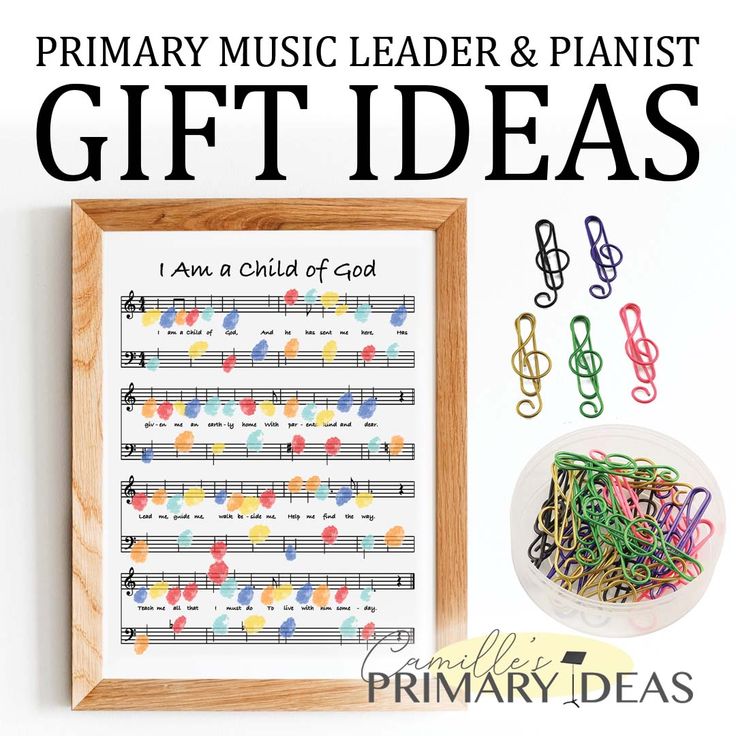 a wooden frame with music notes and paper clips on it, next to the words primary music leader & plantist gift ideas