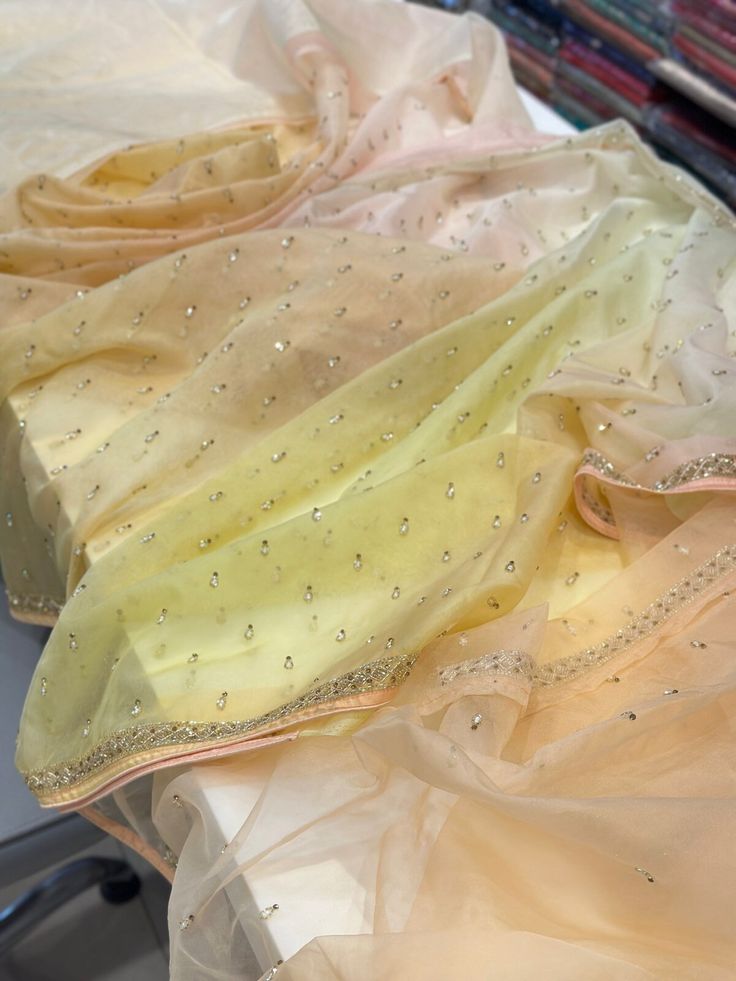 Four colour dye. Hand Embroidery on soft organza. Festive Sheer Organza Saree, Yellow Embellished Georgette Dupatta, Traditional Sheer Organza Saree, Elegant Summer Tissue Silk Dupatta, Elegant Tissue Silk Dupatta For Summer, Summer Organza Saree With Resham Embroidery, Summer Organza Dupatta With Intricate Embroidery, Embellished Multicolor Silk Dupatta, Traditional Sheer Georgette Dupatta