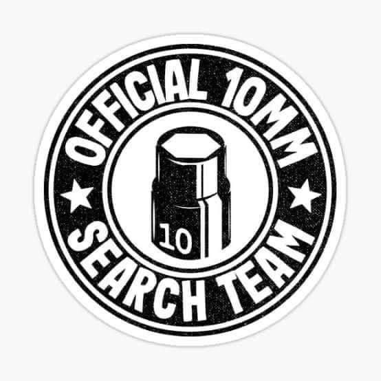 a black and white sticker with the words official tom search team