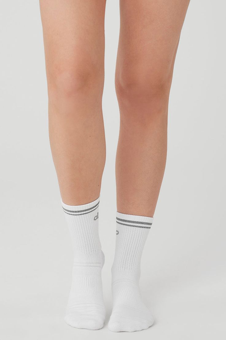 Step into your new favorite socks—they’re stretchy and sweat-wicking (for performance) and finished with a reflective Alo logo (for subtle flash in low light). Don’t miss the functional details, like ribbing at the ankles, ribbing at the midfoot and slight padding at the heels and toes for a comfortable fit. Sweat Resistant Athleisure Socks For Gym, Sweat Resistant Gym Socks Athleisure, Sweat Resistant Gym Socks In Athleisure Style, Sporty Breathable Socks For Workout, Sporty Gray Socks For Training, Sporty Sweat-resistant Gym Socks, Sporty Gray Socks For Sports, Athleisure Anti-odor Socks For Gym, Sporty Gray Sports Socks