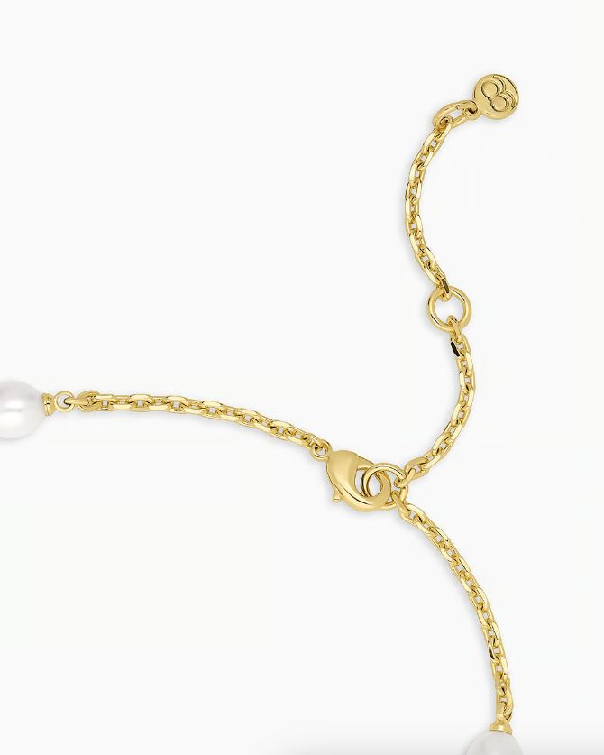 The Phoebe Necklace is crafted with organic shaped pearls on a gold plated chain for a look that's dainty, romantic and refined. We love how pearls effortlessly elevate any outfit, and can easily transition from day to night. Combining pearls with gold creates a timeless, chic pairing, layer your pearl necklace with gold chains for a fully layered look. 16" chain + 2" extender. Adjustable in 1" increments 16" - 18" Freshwater pealrs measure 1/4" by 5/16" Lobster closure Available in 18k gold pla Gold-tone Adjustable Chain Pearl Necklace, Gold-tone Pearl Necklace With Adjustable Chain, Chic Gold Pearl Necklace With Delicate Chain, Elegant Everyday Pearl Necklace With Chain, Luxury Gold-tone Pearl Chain Necklace, Elegant Adjustable Chain Pearl Necklace, Elegant Adjustable Pearl Necklace With Chain, Elegant Adjustable Gold-plated Pearl Necklace, Elegant Gold-tone Pearl Necklace With Adjustable Chain