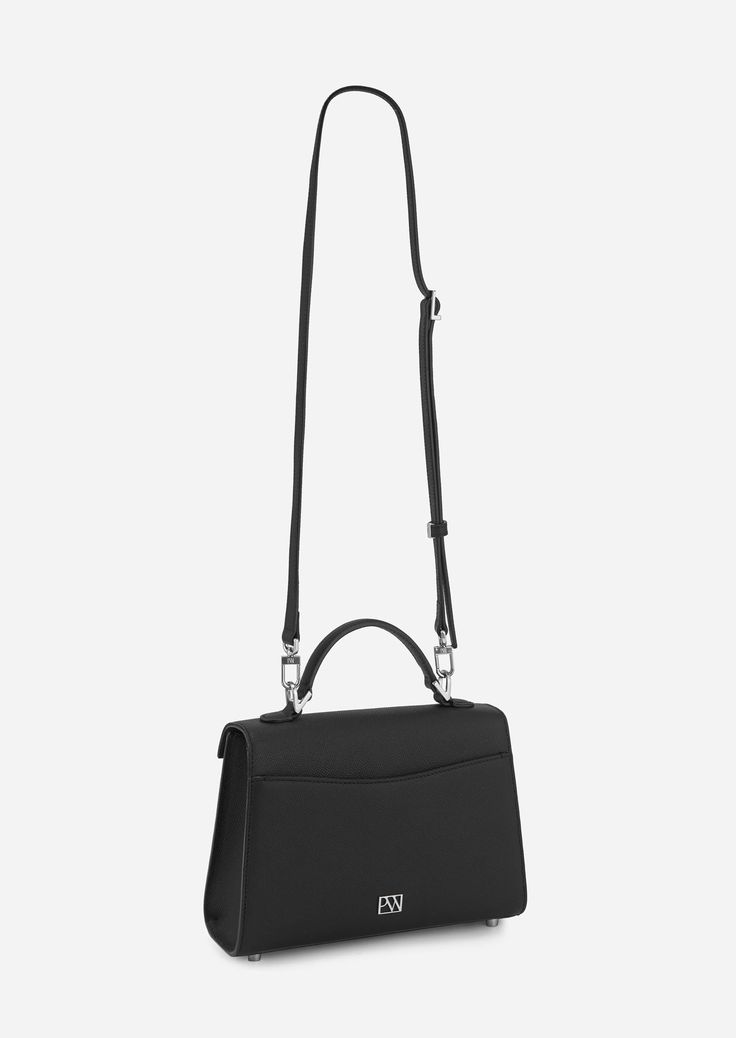 Inspired by Grace Kelly's enduring style, the Grace Top Handle Bag is meticulously crafted from premium USA full-grain textured calfskin leather, ensuring both durability and elegance. Its timeless and versatile design features a thoughtfully structured interior that comfortably accommodates all your everyday essentials. Whether day or night, you'll find yourself instinctively reaching for this chic and easy-to-wear masterpiece. Parisa Wang, Beautiful Handbags, Find Yourself, The Grace, By Grace, Purses Designer, Grace Kelly, Handle Bag, Top Handle