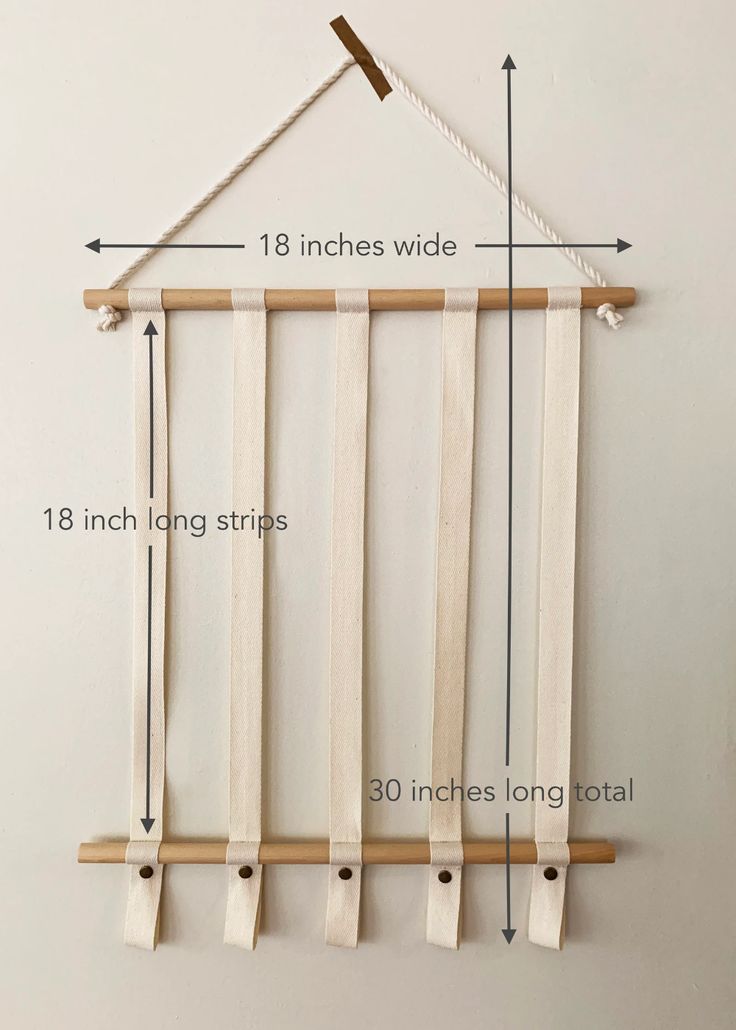 the measurements for hanging clothes on a wall