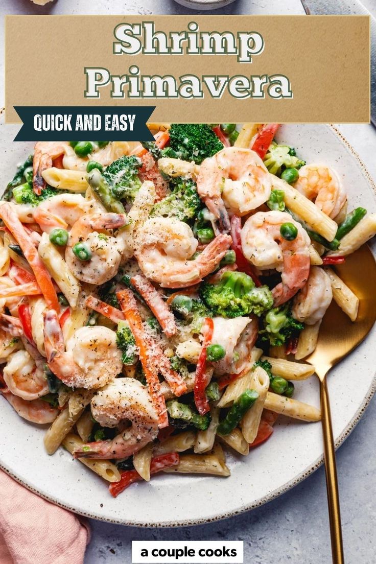 shrimp, broccoli and pasta in a white bowl