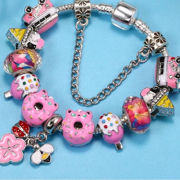 Size 17 Cm Or About 6 1/2 Inches Cutest Pink Charms Include: Donuts, Cupcakes, Buses, Beads, And Snow Cones! Why Fit In When You Can Stand Out? Be A Flamingo In A Flock Full Of Pigeons Cute Round Charms Jewelry, White Alloy Charm Bracelet As Gift, Playful Metal Jewelry For Gifts, Playful Metal Jewelry Gift, Playful Metal Jewelry As A Gift, Cute Silver Charm Bracelet For Party, Playful Nickel-free Silver Bracelets, Playful Silver Nickel-free Bracelets, Cute Jewelry With Charms And Round Beads