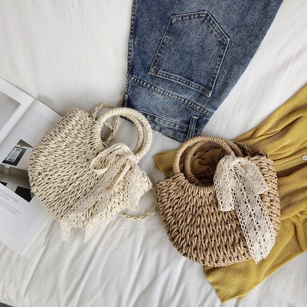 Perfect for sunny days and picnics, this basic crescent shaped straw bag is complete with circular handles and a crossbody shoulder strap, detachable lace ribbon and lined with a drawstring pouch. 19cm 23cm x 8.5cm 7.48" x 9.06" x 3.35" Trendy Beige Bucket Bag For Spring, Chic Beige Crochet Bag For Spring, Casual Spring Bucket Bag With Braided Handles, Casual Spring Basket Bucket Bag, Chic Beige Beach Bag For Spring, Summer Bucket Shoulder Bag With Adjustable Strap, Casual Straw Bucket Bag For Spring, Summer Shoulder Bucket Bag With Adjustable Strap, Chic Beige Straw Bag For Spring