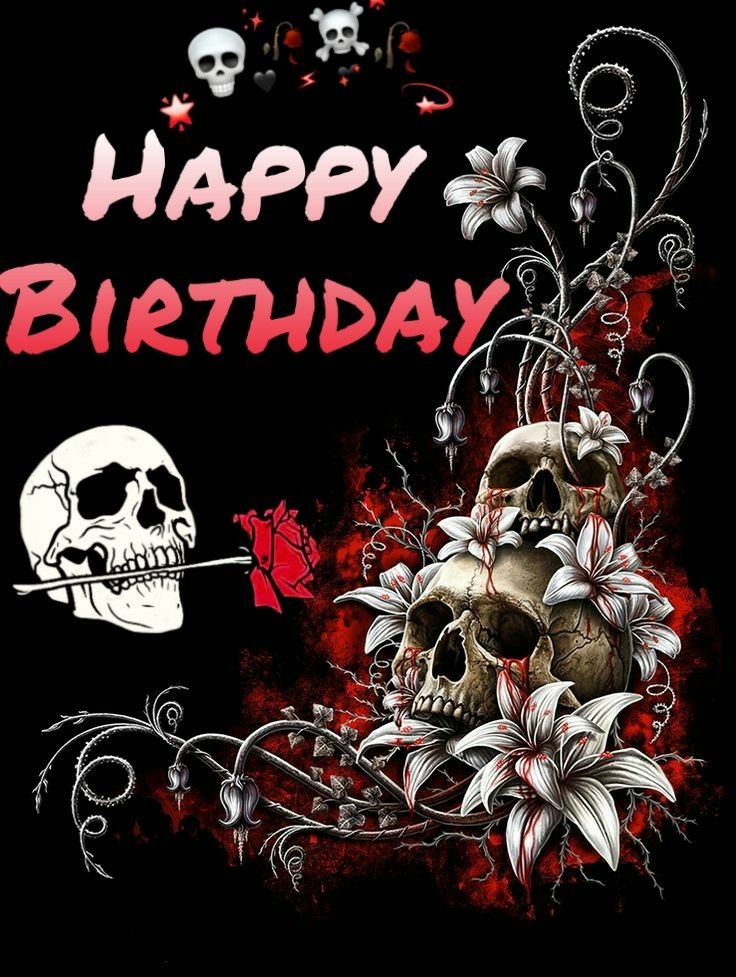 a happy birthday card with skulls and flowers