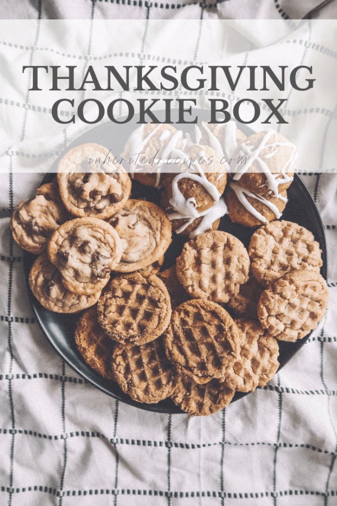 a plate full of cookies with the words thanksgiving cookie box written on it in white