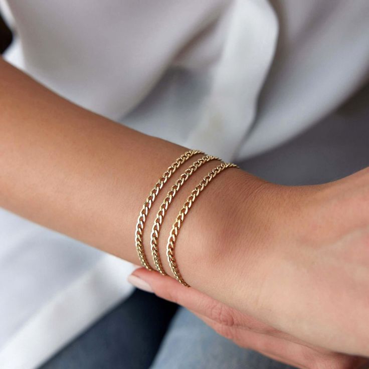 Our very simple and elegant plain chain bracelet. This chain bracelet is ideal for minimalists. Because we craft our pieces with real 14k solid gold, you can enjoy this delicate piece with a free mind every day. Our elegant bracelet is crafted with real 14k solid gold(not plated, not vermeil, not gold filled) The bracelet measure 3. 2 mm in width Since we work with real gold, you can enjoy this piece with a free mind without the worry of water, conditioner or alcohol contact. Real gold keeps its Everyday Fine Jewelry Bracelets With Cable Chain, Everyday Fine Jewelry Cable Chain Bracelet, Dainty Everyday Chain Bracelet With Curb Chain, Dainty Curb Chain Bracelet For Everyday, Minimalist 14k Gold Curb Chain Bracelet, Dainty Everyday Curb Chain Bracelet, Simple 14k Yellow Gold Bracelets, Everyday 14k Gold Curb Chain Bracelet, Elegant 14k Gold-filled Cable Chain Bracelets