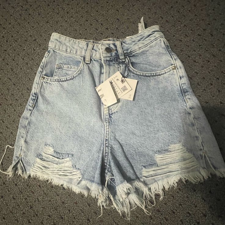 Brand New!! Zara Denim Hi Rise Shorts In Light Blue Size 2 Zara High Waist Light Wash Jeans, Zara High Rise Distressed Bottoms, Zara Distressed Mid-rise Bottoms, Trendy Distressed Zara Bottoms, Zara Ripped Jeans In Medium Wash, Zara Mid-rise Distressed Bottoms, Zara Blue Jean Shorts With Frayed Hem, Zara Ripped Light Wash Jeans, Zara Ripped Denim Blue Jeans