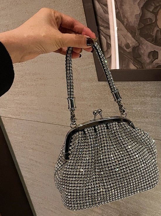 This vintage-inspired evening bag features luminous rhinestones that add an elegant sparkle to any outfit. With a modern design and luxurious feel, you can show off your timeless style. Modern Womens Fashion, Crystal Clutch, Curator Style, Show Off, Clutch Purse, Online Retail, Timeless Style, Modern Woman, Evening Bags