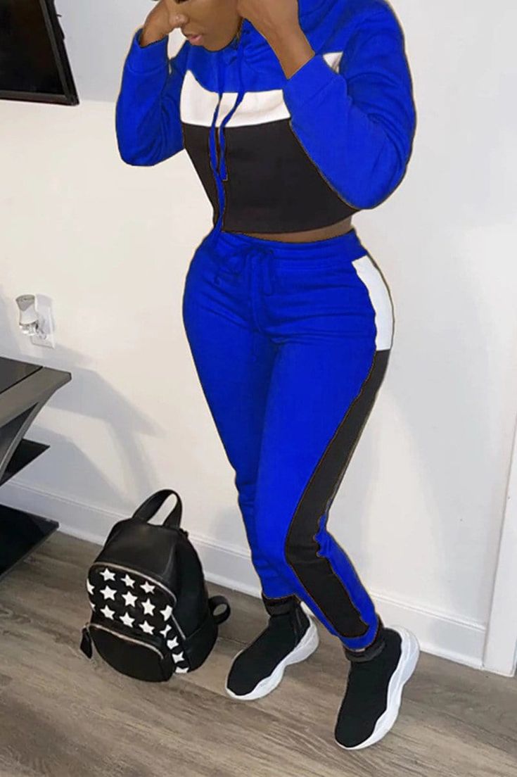 Casual Blue Patchwork Pants, Blue Drawstring Athleisure Pants, Trendy Blue Pants With Drawstring, Blue Stretch Pants With Drawstring, Blue Drawstring Pants For Streetwear, Trendy Blue Drawstring Pants, Blue Pants For Winter Sports, Blue Outdoor Pants For Spring, Blue Stretch Pants For Outdoor