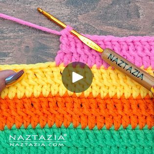 the crochet stitch is being worked on by someone using a knitting needle and yarn