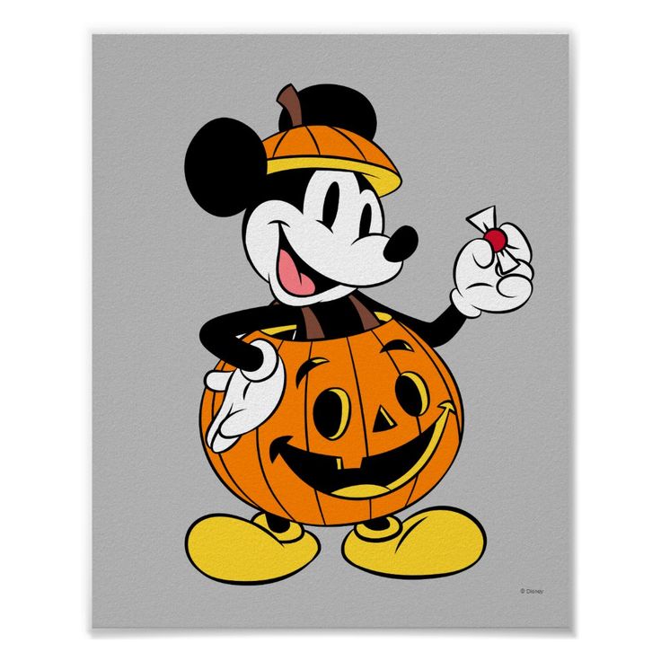 mickey mouse holding a jack - o'- lantern in front of a gray background