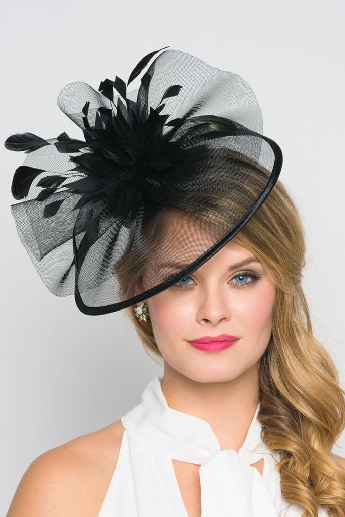 You are a picture of glamorous sophistication when you put on this romantic fascinator! Modern with a vintage touch, this elegant horse hair mesh base adorns a beautiful bouquet of soft feathers. A soft satin trim offers and allure that's simply breathtaking. - Horse hair mesh - Easy wear slip-on headband Elegant Feathered Fascinator For Party, Elegant Feather Fascinator For Party, Elegant Black Feather Trim Costume Hat, Spring Party Feather Trim Fascinator, Elegant Black Costume Hat With Feather Trim, Fitted Black Fascinator With Feather Trim, Feather Fascinator For Royal Ascot, Elegant Party Fascinator With Feather Trim, Chic Black Wedding Headpiece