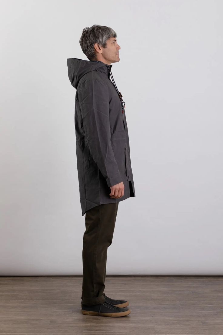 Long hooded parka with fishtail hem made from British Millerain waxed canvas, the Robson is here for those endless cold and wet days. Features hand pockets, drawcord at waist, and two-way front zip with button-closure storm flap. An everyday workhorse that lays nicely over your winter pieces and easily transitions into spring. 100% Waxed Cotton from British Millerain Drawstring waist Flannel lined Ample pockets Also available in Olive Urban Cotton Parka For Fall, Urban Style Cotton Parka For Fall, Cotton Parka With Drawstring Hood For Cold Weather, Hooded Cotton Raincoat For Fall, Cotton Parka With Detachable Hood For Fall, Fall Cotton Parka With Detachable Hood, Cotton Parka With Adjustable Hood For Cold Weather, Casual Cotton Raincoat For Rainy Weather, Utility Fall Parka With Storm Flap