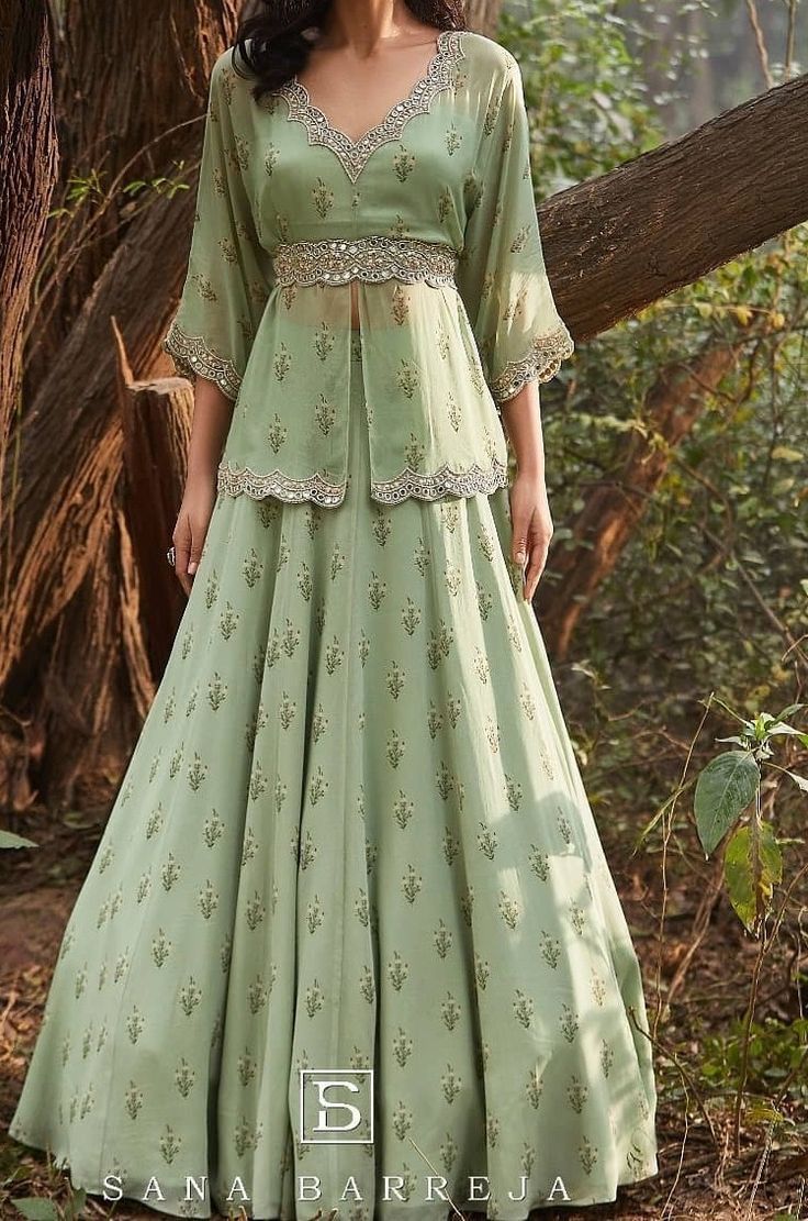 Long Lengha Blouse, Ghagra Long Blouse Designs, Georgette Gowns Western, Belt Gown Style Indian, Peplum Top Sharara Set, Palazzo Pant With Crop Top And Coat, Skirt And Long Top Indian, Kurti Ghagra Designs, Lengha With Long Top