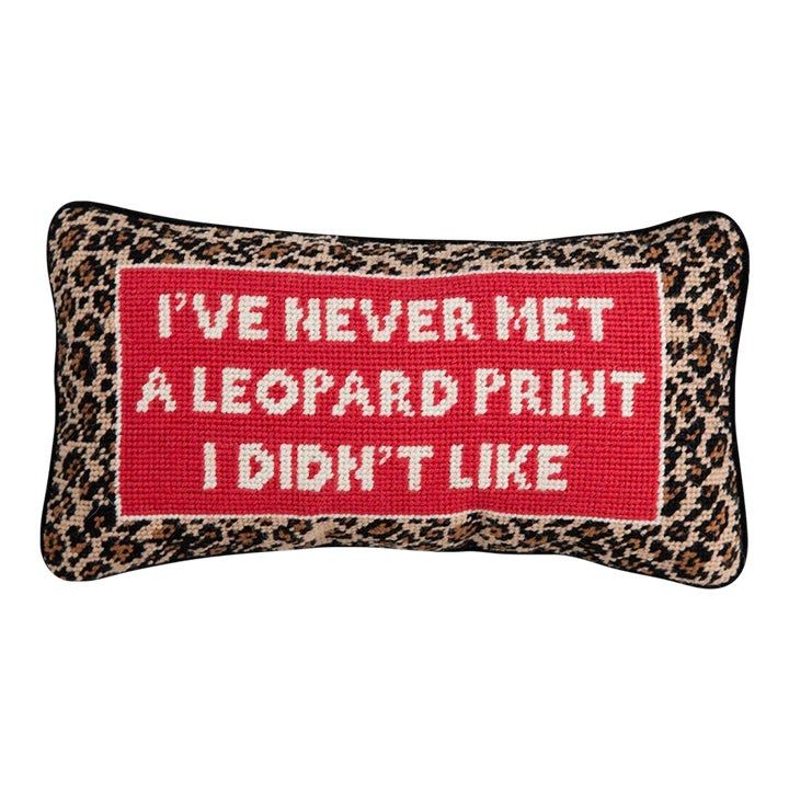 a leopard print pillow that says i've never met a leopard print i didn't like