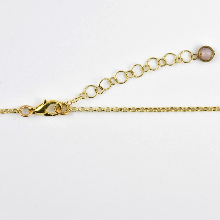 Chain length is 34 inches, adjustable to 36" Lobster type clasp Vermeil chain with brass Gemstones are Rose Quartz and labradorite Made from re-purposed vintage material About Joli Jewelry Joli Jewelry was started by Jody Lyons in 1984. Inspired by her love of the styles of the 1920's-1960's and her childhood fascination with her mother's and grandmother's jewelry boxes, she began designing pieces for herself while still in college. She was soon discovered by local shop owners in the West Villag Rose Gold Brass Jewelry With Adjustable Chain, Dainty Adjustable Brass Charm Necklace, Adjustable Brass Jewelry With Delicate Chain, Adjustable Delicate Chain Brass Jewelry, Adjustable Gold Jewelry With Cable Chain, Adjustable Gold Cable Chain Jewelry, Adjustable Cable Chain Pendant Jewelry, Silver Brass Necklace With Cable Chain, Vintage Lariat Necklace With Adjustable Chain For Gifts