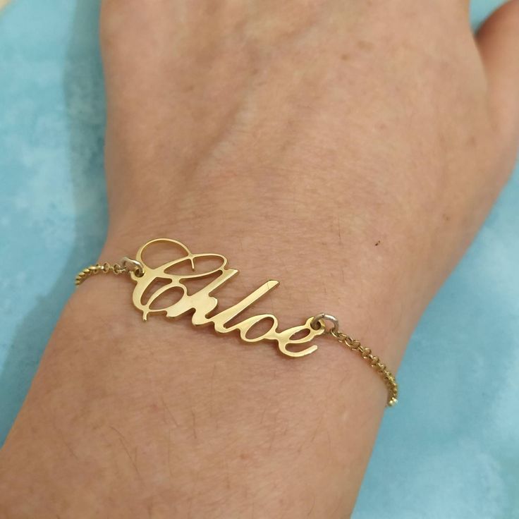 14k Real Gold - Personalized Jewelry - Name Bracelet - Nameplate Bracelet - Custom Bracelet - Personalized Gift - Christmas Gift - Chloe . . . . . . . . . . . . . . . . . . . . . . . . . . . . . . . . . . . . . . . . . . . . . . . . . . . . . . . . . . . Looking for a thoughtful gift for your loved one? You will love this high quality 14k Real Gold Personalized Jewelry Name Bracelet. This is a perfect gift for your girlfriend or wife. This lovely 14k Solid Gold Nameplate Bracelet is made to orde Personalized Gold Chain Bracelet For Birthday, Customized Gold Chain Bracelet For Anniversary, Gold Charm Bracelet With Custom Name For Anniversary, Custom Name Gold Charm Bracelet For Anniversary, Gold Chain Bracelet With Custom Name For Personalized Gift, Customized Gold Chain Bracelet For Personalized Gift, Gold Dainty Chain Bracelet For Birthday, Dainty Customizable Gold Bracelets, Dainty Gold Chain Bracelet For Birthday