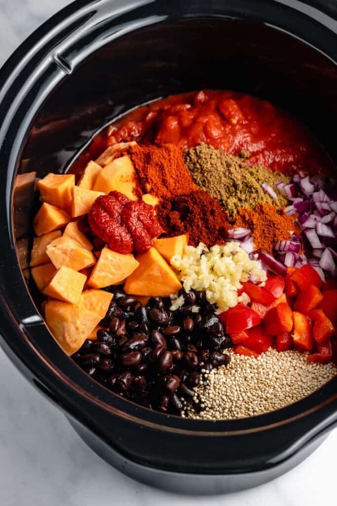 an image of food in the slow cooker to make tacos and burritos