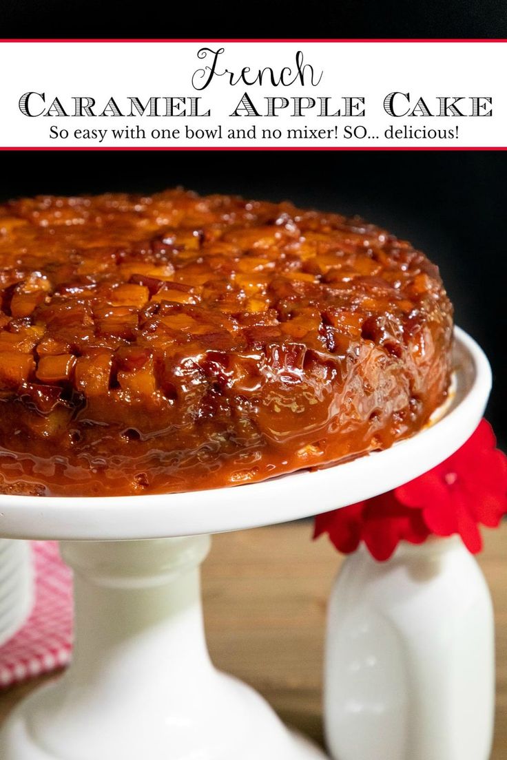 a close up of a cake on a plate with the words caramel apple cake above it